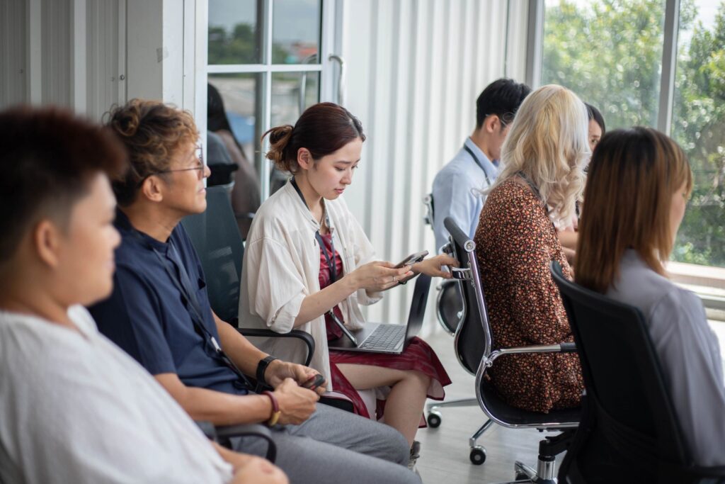 Portrait of young business attending business conference